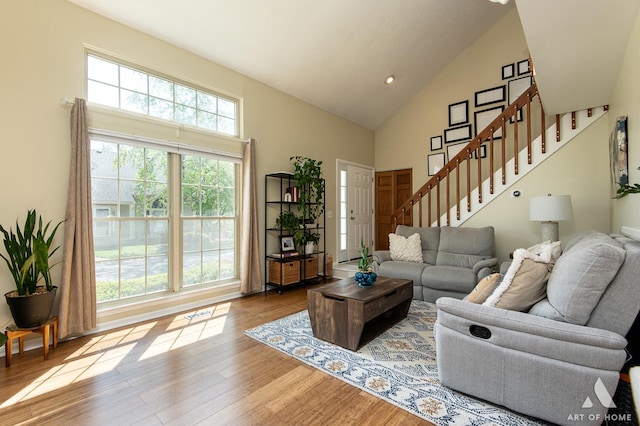 1016 N Knollwood Dr, Palatine, IL 60067 - living area featuring high vaulted ceiling, stairway, and wood finished floors