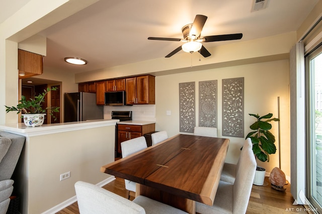 1016 N Knollwood Dr, Palatine, IL 60067 - dining room with ceiling fan and wood finished floors