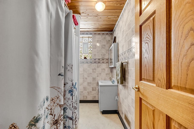 1311 Harvey Ave, Berwyn, IL 60402 - bathroom featuring wood ceiling, tile walls, curtained shower, and vanity