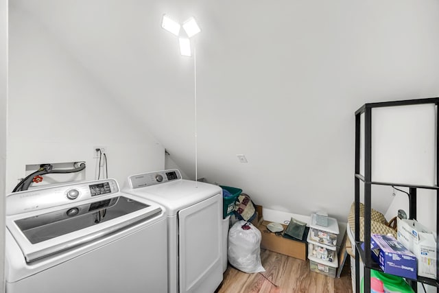 1311 Harvey Ave, Berwyn, IL 60402 - laundry area with independent washer and dryer and light wood-style flooring