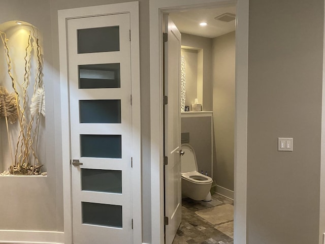 313 Roger Rd, Darien, IL 60561 - bathroom with toilet and baseboards
