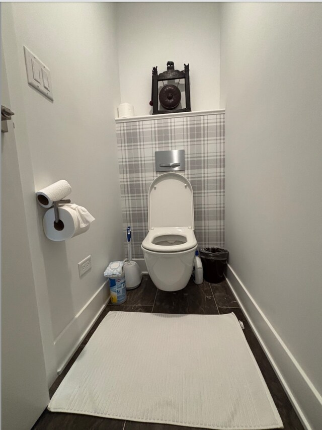 313 Roger Rd, Darien, IL 60561 - bathroom with baseboards, toilet, and marble finish floors