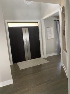 313 Roger Rd, Darien, IL 60561 - foyer featuring baseboards and dark wood finished floors