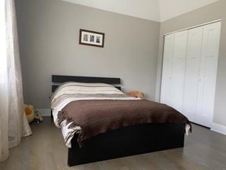 313 Roger Rd, Darien, IL 60561 - bedroom featuring a closet and wood finished floors