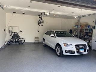 313 Roger Rd, Darien, IL 60561 - garage featuring a garage door opener and baseboards