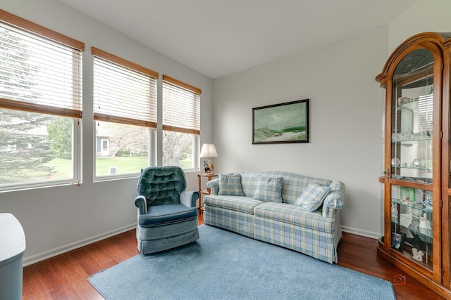 604 S Essington Dr, Round Lake, IL 60073 - living area featuring healthy amount of natural light, wood finished floors, and baseboards