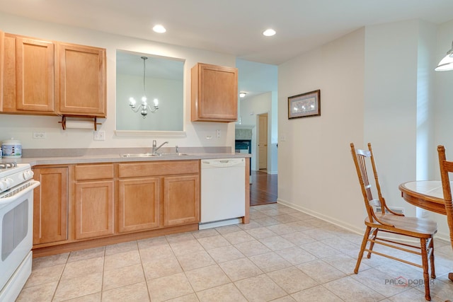 604 S Essington Dr, Round Lake, IL 60073 - kitchen with a sink, white appliances, a chandelier, light countertops, and recessed lighting