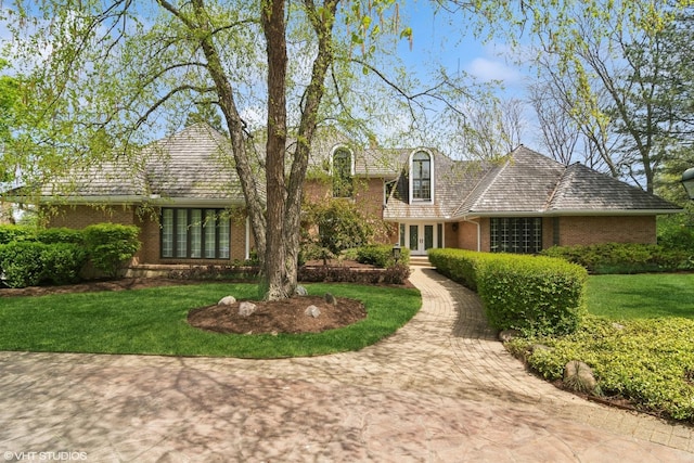 80 Gaelic Ct, Inverness, IL 60010 - view of front of property featuring brick siding, french doors, and a front yard
