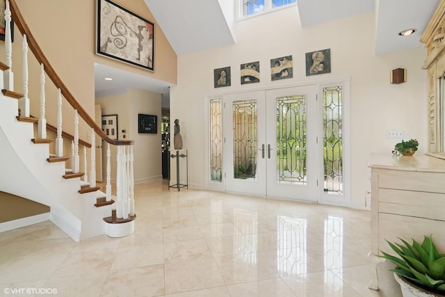 80 Gaelic Ct, Inverness, IL 60010 - foyer entrance featuring a towering ceiling, french doors, baseboards, stairs, and marble finish flooring