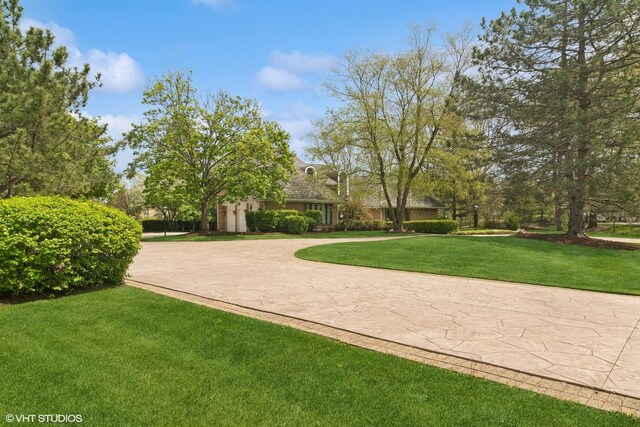 80 Gaelic Ct, Inverness, IL 60010 - view of property's community with curved driveway and a lawn