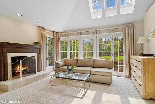 80 Gaelic Ct, Inverness, IL 60010 - living area with light colored carpet, high vaulted ceiling, a premium fireplace, a skylight, and recessed lighting