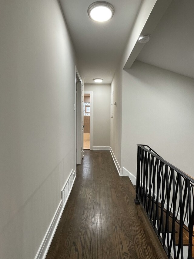 10724 Leclaire Ave, Oak Lawn, IL 60453 - corridor featuring dark wood finished floors and baseboards