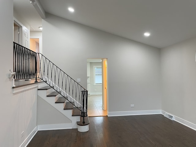 10724 Leclaire Ave, Oak Lawn, IL 60453 - entrance foyer with stairs, baseboards, wood finished floors, vaulted ceiling, and recessed lighting