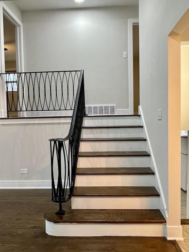 10724 Leclaire Ave, Oak Lawn, IL 60453 - stairway featuring wood finished floors and baseboards