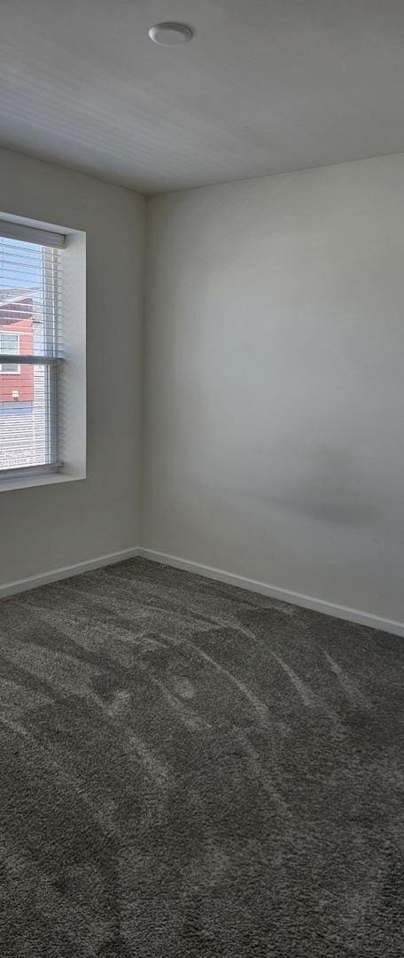 858 Finley Dr, Aurora, IL 60504 - carpeted spare room featuring baseboards