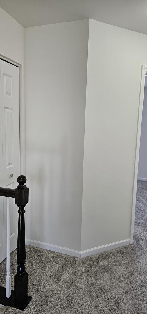 858 Finley Dr, Aurora, IL 60504 - carpeted spare room featuring baseboards