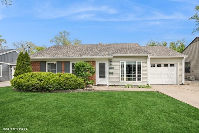 ranch-style house with driveway, an attached garage, a front yard, and a shingled roof