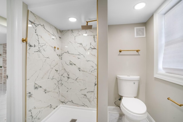 bathroom with baseboards, toilet, a marble finish shower, marble look tile flooring, and recessed lighting