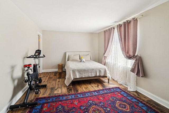 711 S River Rd Unit 503, Des Plaines, IL 60016 - bedroom with baseboards and wood finished floors