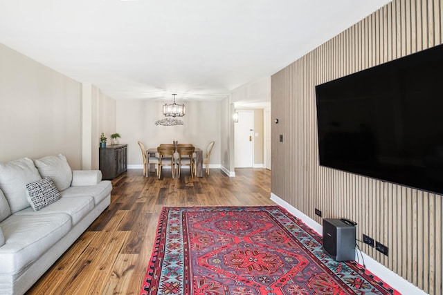 711 S River Rd Unit 503, Des Plaines, IL 60016 - living area with wood finished floors, a chandelier, and baseboards