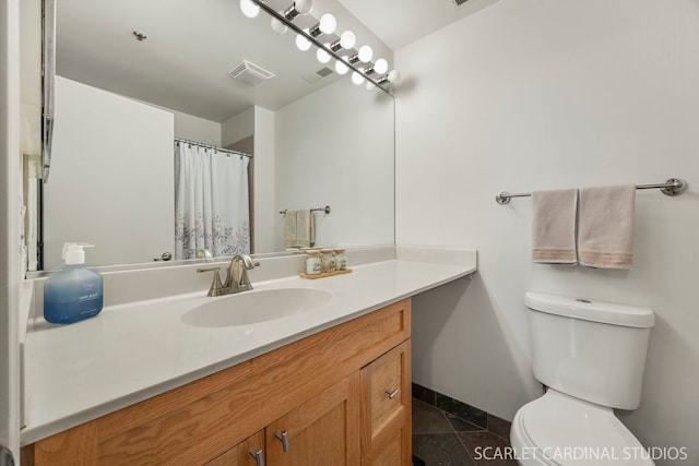 1735 W Diversey Pkwy Unit 416, Chicago, IL 60614 - bathroom with baseboards, toilet, and vanity