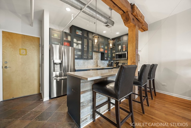 1735 W Diversey Pkwy Unit 416, Chicago, IL 60614 - bar featuring stainless steel appliances, decorative backsplash, baseboards, decorative light fixtures, and recessed lighting