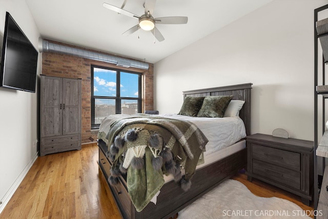 1735 W Diversey Pkwy Unit 416, Chicago, IL 60614 - bedroom featuring light wood-style flooring, a ceiling fan, lofted ceiling, and baseboards