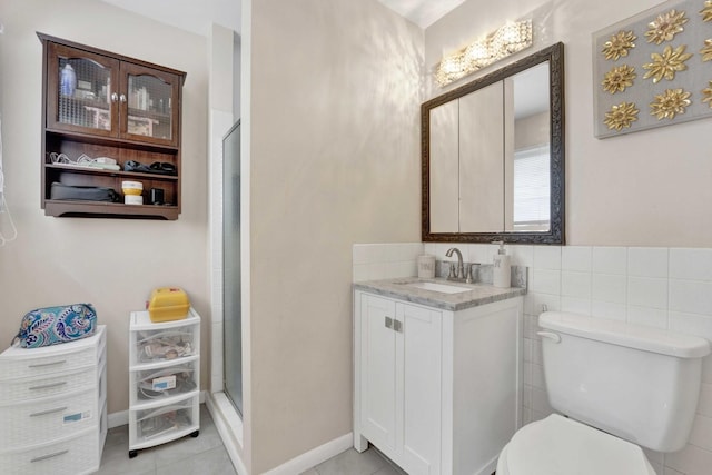 884 Arnold Ct, Des Plaines, IL 60016 - full bath with toilet, tile patterned floors, a shower stall, vanity, and tile walls