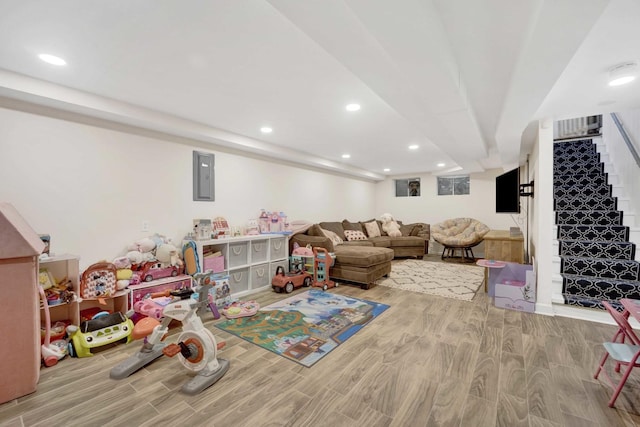 884 Arnold Ct, Des Plaines, IL 60016 - recreation room with wood finished floors, recessed lighting, and electric panel