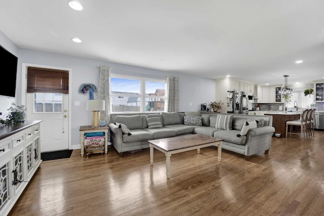 884 Arnold Ct, Des Plaines, IL 60016 - living area featuring recessed lighting, healthy amount of natural light, dark wood-type flooring, and a chandelier