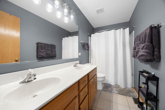 24001 W Walnut Cir, Plainfield, IL 60585 - full bathroom with tile patterned flooring, double vanity, toilet, and a shower with curtain