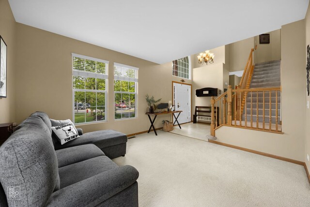 24001 W Walnut Cir, Plainfield, IL 60585 - carpeted living room featuring stairway, a chandelier, and baseboards