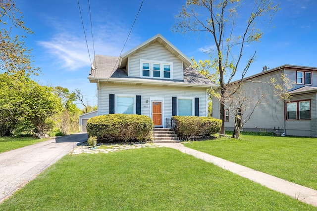 bungalow-style house with a front yard
