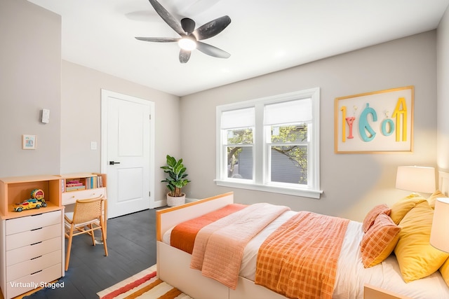 bedroom with wood finished floors and ceiling fan