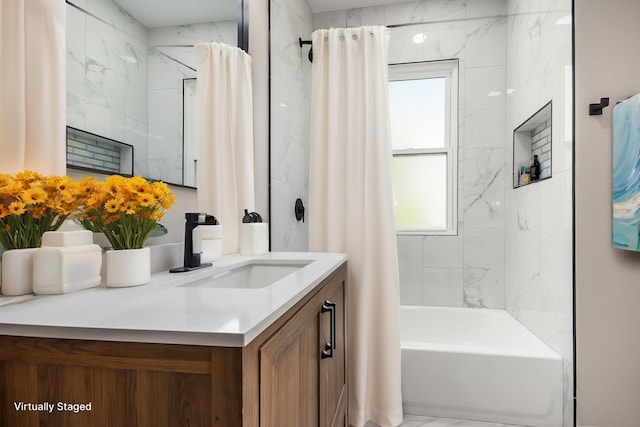 bathroom featuring healthy amount of natural light, vanity, and shower / tub combo