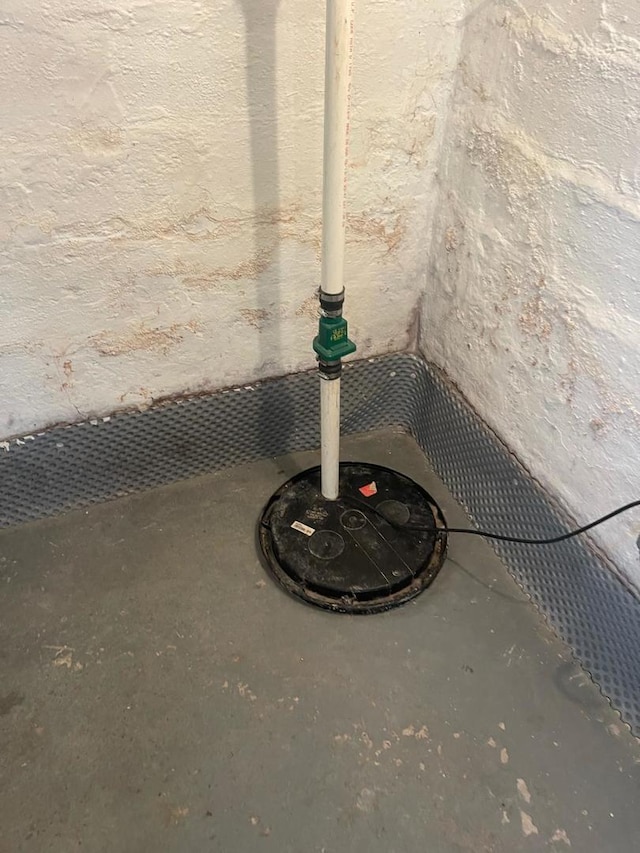 244 N 7th Ave, Kankakee, IL 60901 - basement view of concrete flooring and drainage system