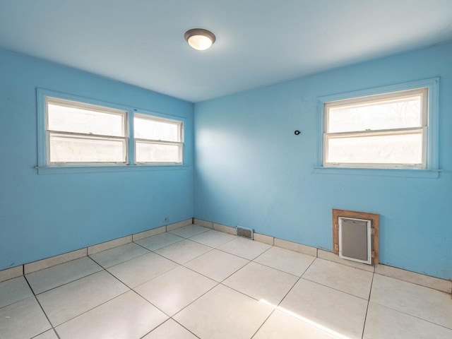 348 Behm Dr, Grayslake, IL 60030 - empty room with plenty of natural light and tile patterned flooring