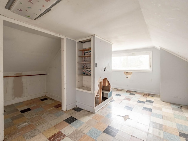 348 Behm Dr, Grayslake, IL 60030 - additional living space featuring vaulted ceiling and tile patterned floors