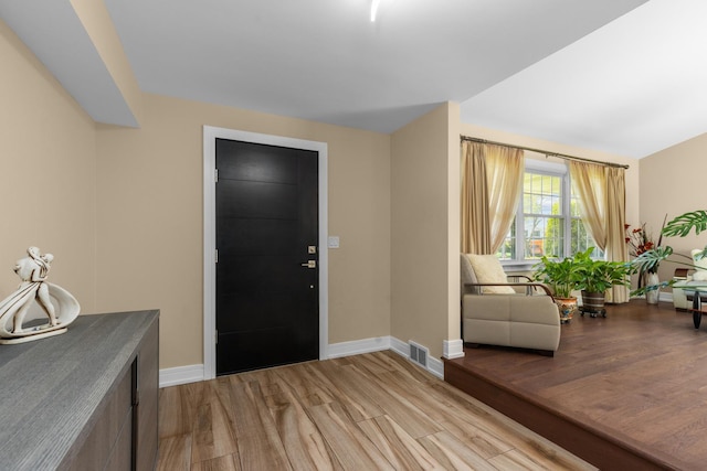 186 Sunrise Dr, Wheeling, IL 60090 - entrance foyer with light wood-style floors and baseboards