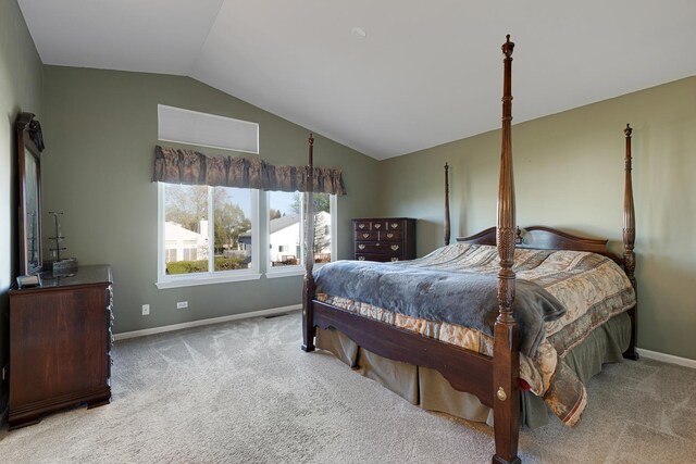 900 Taralon Trl, Lake In The Hills, IL 60156 - bedroom with lofted ceiling, carpet, and baseboards