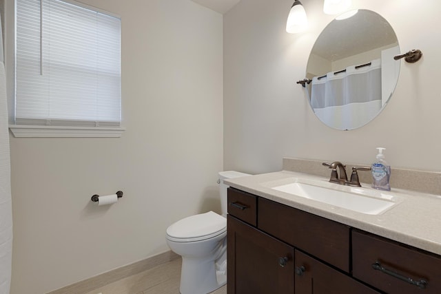 900 Taralon Trl, Lake In The Hills, IL 60156 - bathroom featuring toilet, vanity, and curtained shower