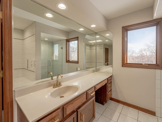 full bathroom featuring baseboards, vanity, tile patterned floors, recessed lighting, and a stall shower
