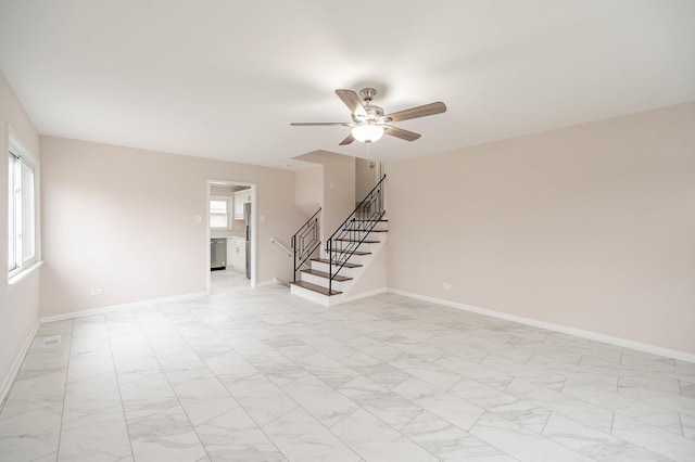 640 Enterprise Rd, Chicago Heights, IL 60411 - spare room featuring stairway, a ceiling fan, and baseboards