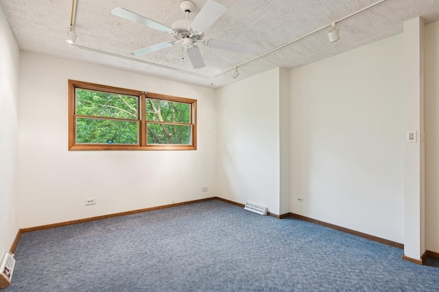 12811 S 82nd Ct, Palos Park, IL 60464 - carpeted spare room featuring track lighting, a textured ceiling, ceiling fan, and baseboards