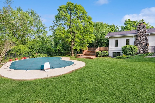12811 S 82nd Ct, Palos Park, IL 60464 - view of swimming pool featuring a diving board, a deck, a yard, a patio area, and stairs
