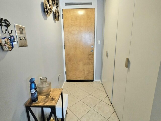 7251 Randolph St Unit C5, Forest Park, IL 60130 - entryway featuring light tile patterned floors and baseboards