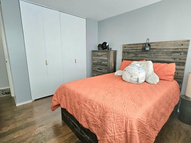 7251 Randolph St Unit C5, Forest Park, IL 60130 - bedroom with wood finished floors, a closet, and baseboards