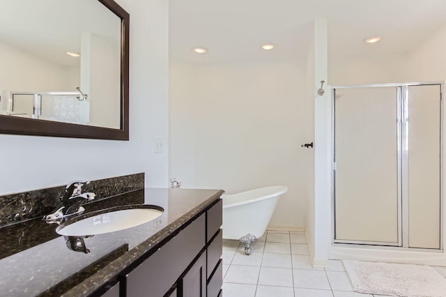 15157 Hilltop Ct, Orland Park, IL 60462 - bathroom with a shower stall, vanity, tile patterned floors, a freestanding bath, and recessed lighting
