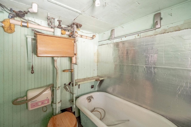 bathroom with a soaking tub