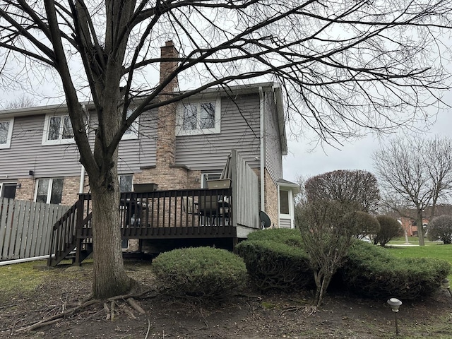 11224 Marley Brook Ct, Orland Park, IL 60467 - rear view of property featuring a deck, a chimney, and fence